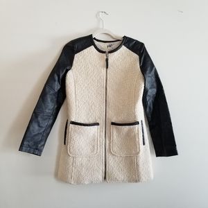 Jolt boucle vegan leather sleeve mid length jacket